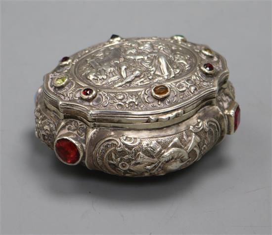 A 19th century German? embossed white metal and multi stone set snuff box and cover, 85mm.